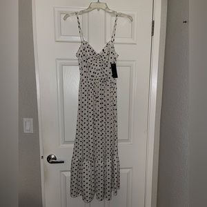 Size: M         Color: black and white polkadots